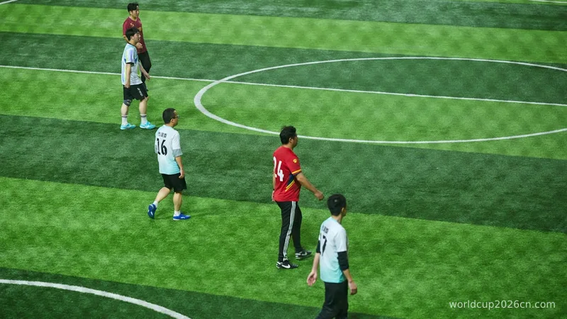 Soccer players on a green field during a game
