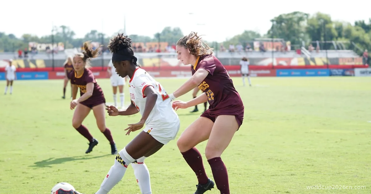 women playing soccer at daytime